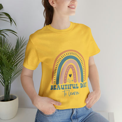 Retro rainbow "It's a beautiful day to learn" Unisex Tee